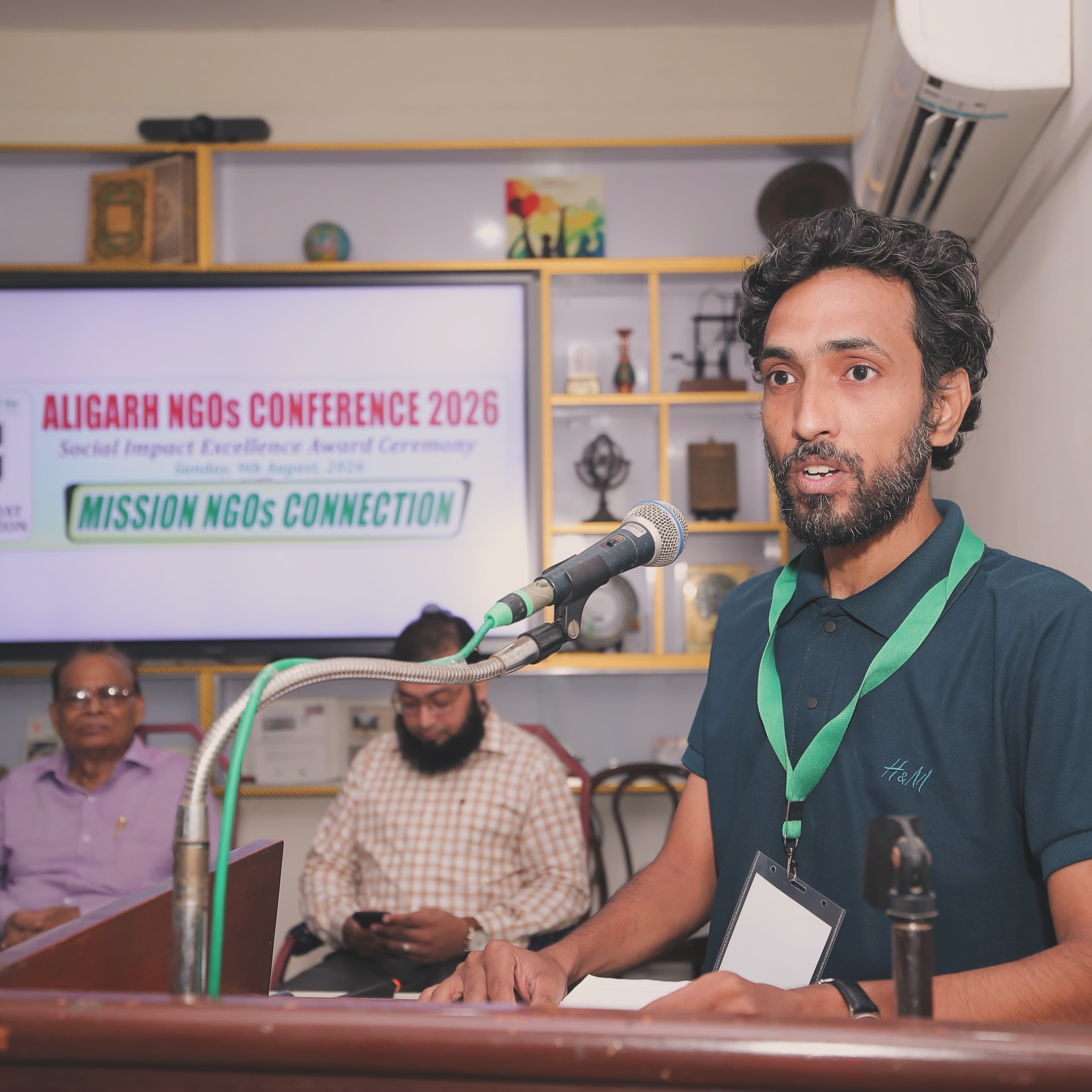 Mohsin Anwer addressing the Aligarh NGOs Conference 2026 from the podium